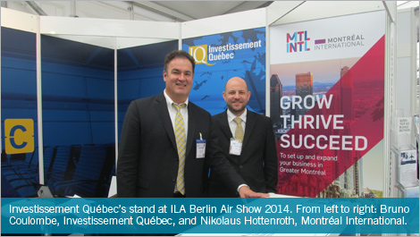 Investissement Québec’s stand at ILA Berlin Air Show 2014. From left to right: Bruno Coulombe, Investissement Québec, and Nikolaus Hottenroth, Montréal International.