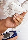 Photo of a diabetic person taking a blood sugar test
