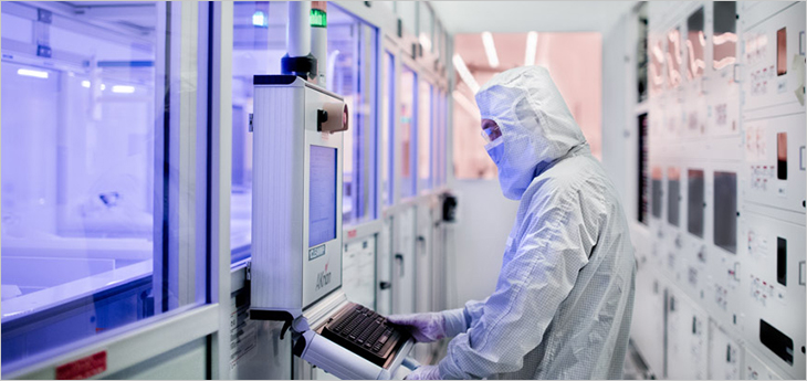 Photo of a technician in a C2MI research lab