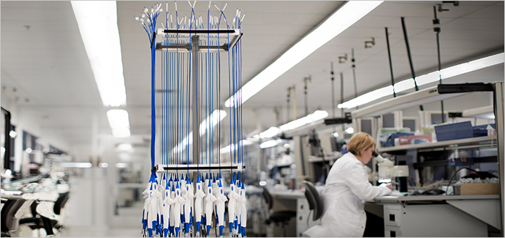 Photo of a rack filled with catheters in a Medtronic CryoCath lab